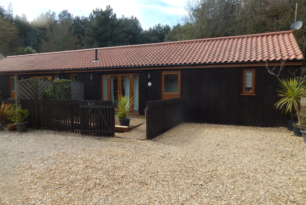 Grade II Listed house and Holiday letting business in 8 acres woodland